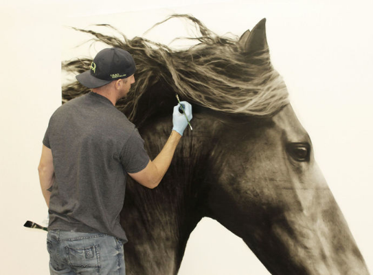 Without color, artist focuses on fine detail