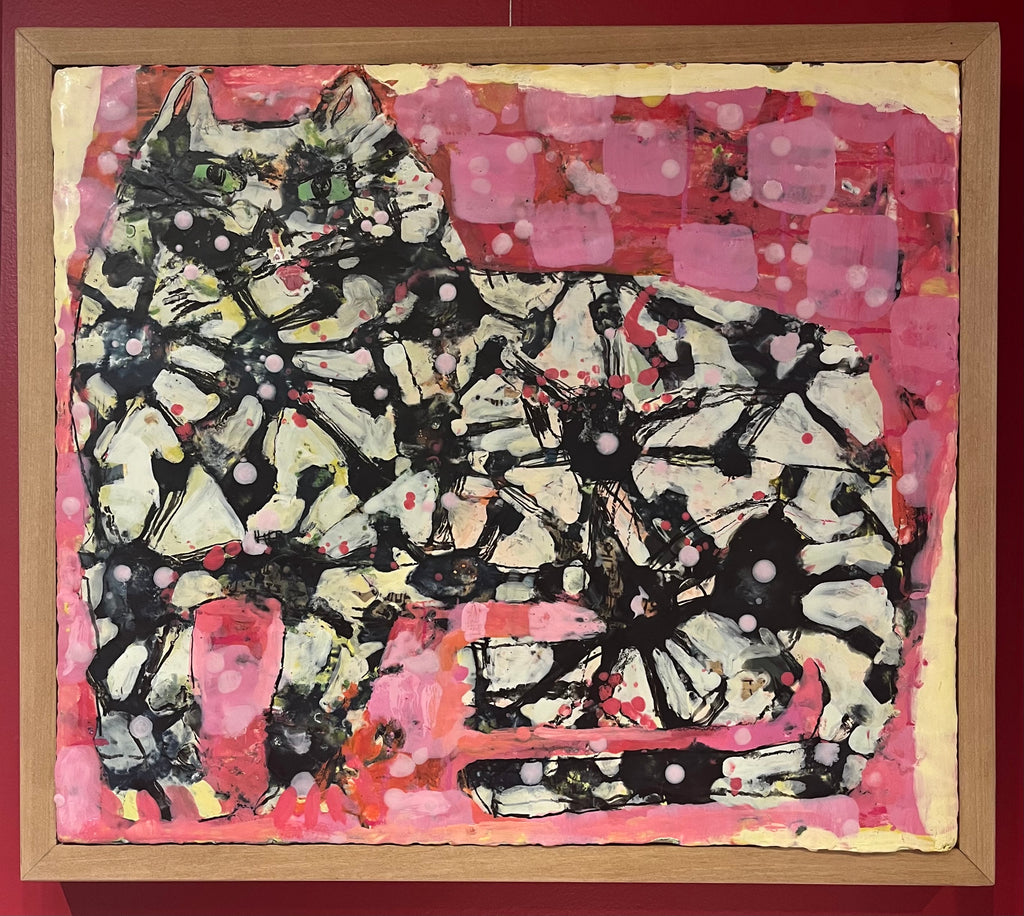 Mixed media portrait of a black and white cat with pink checkered background