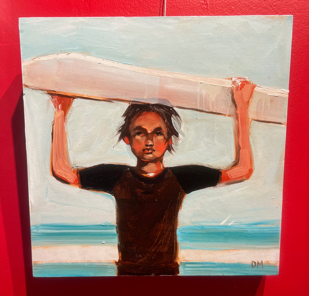 boy child ocean surfboard brown hair blue water summertime 