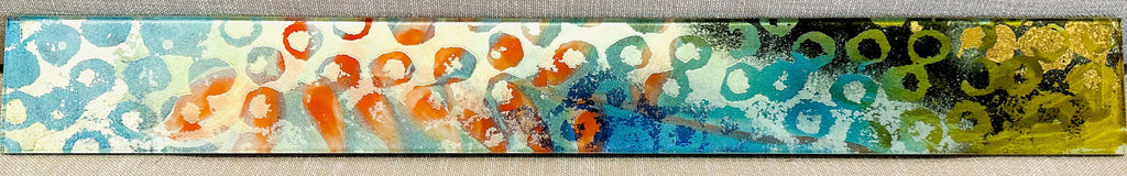 Abstract mixed media on glass by Carol Bennett in yellow, green, blue, orange, and light blue