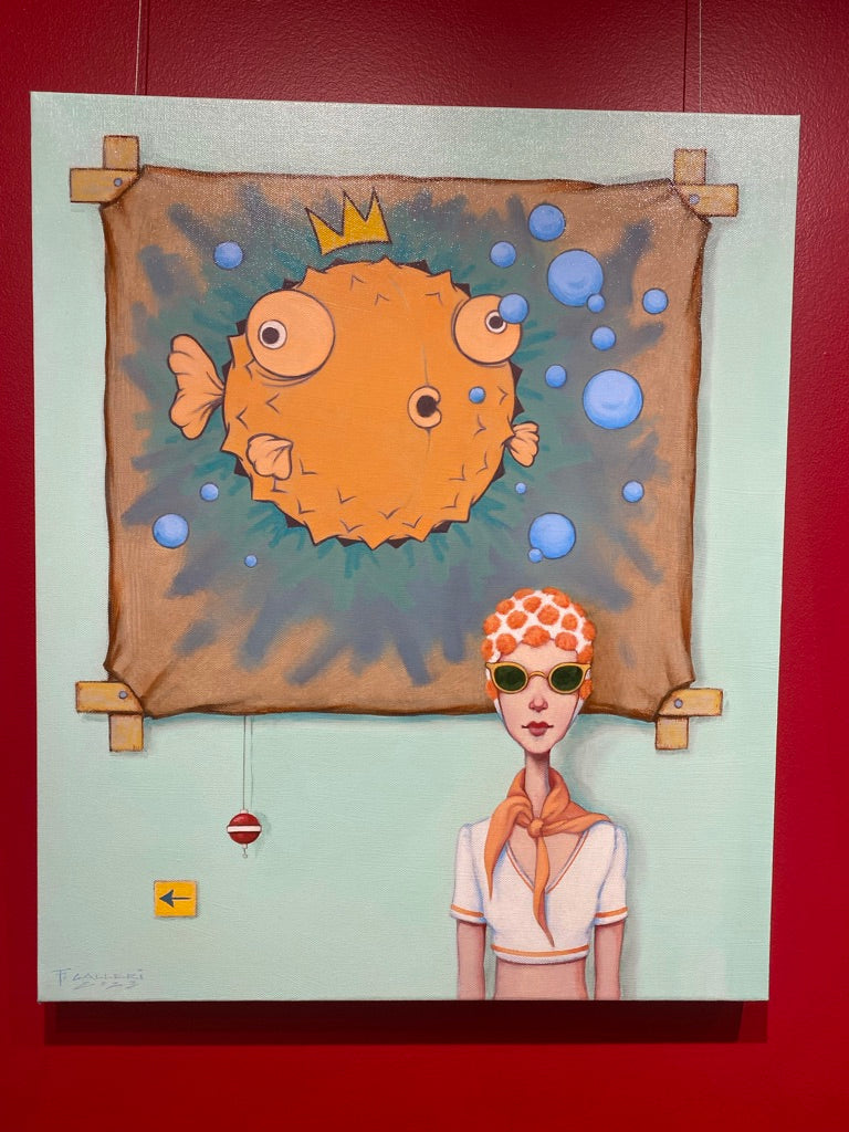oil painting of a woman with sunglasses, orange and white cap, standing in front of orange puffer fish painting