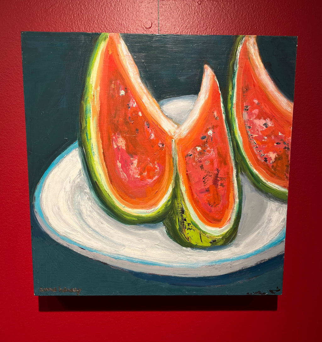Oil on panel painting of three watermelon slices in a dish.