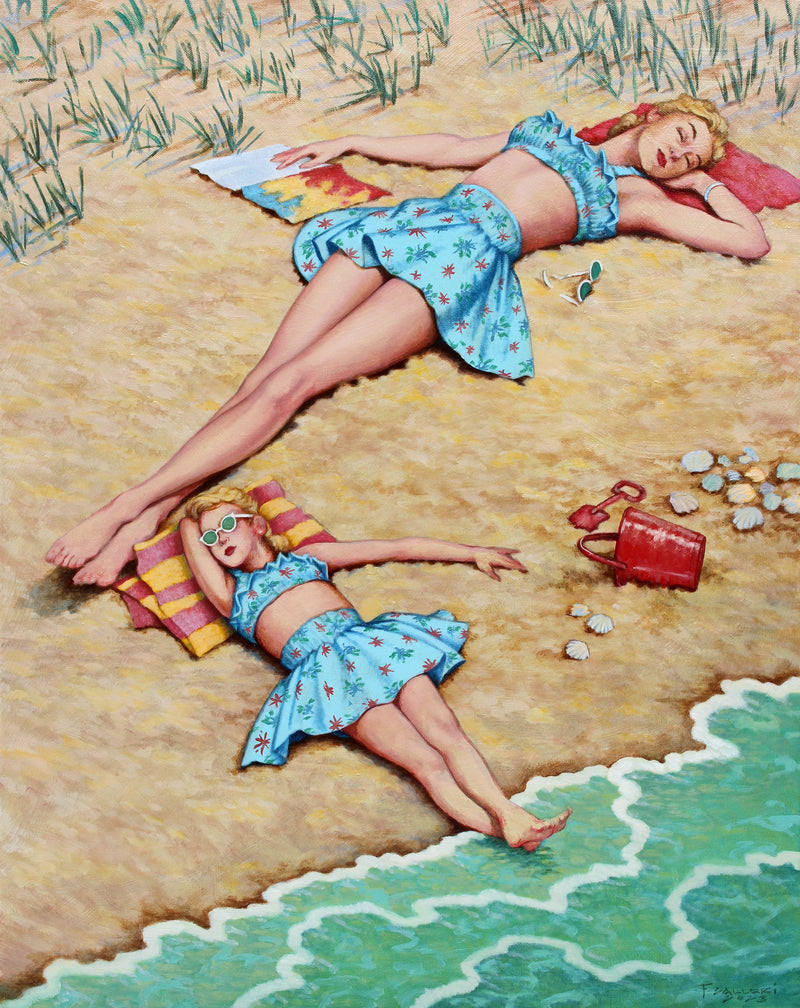 Aerial view of a mother and daugther in blue tops and skirts laying on the beach