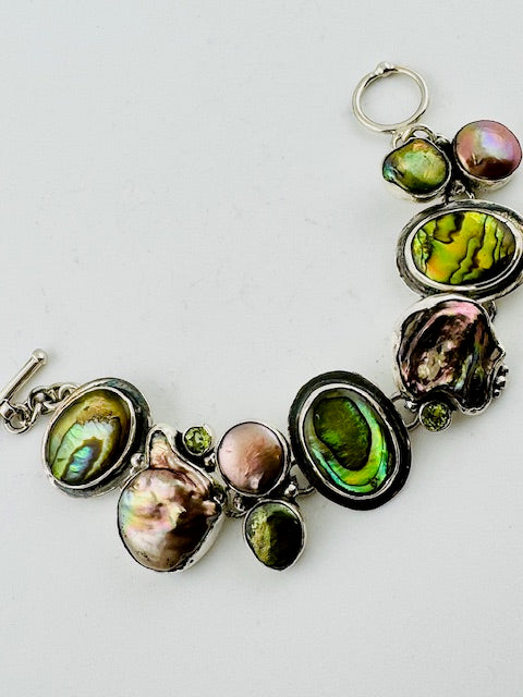 "Abalone, copper pearl, peridot bracelet"