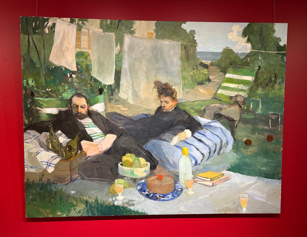 Italian painting of two men having a picnic by the blue green sea
