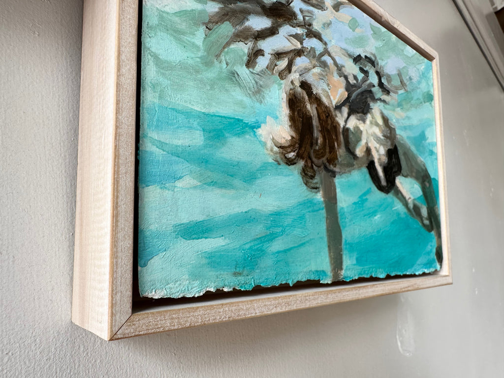 Underwater oil painting of a swimmer in a black suit floating on her back