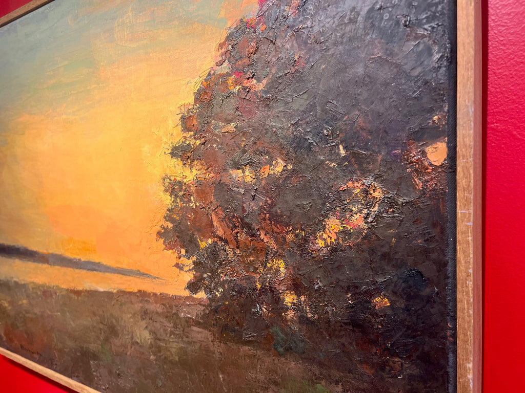 Oil painting by Larry Horowitz of a landscape with soft yellow sky and large, dark tree to the right of the painting