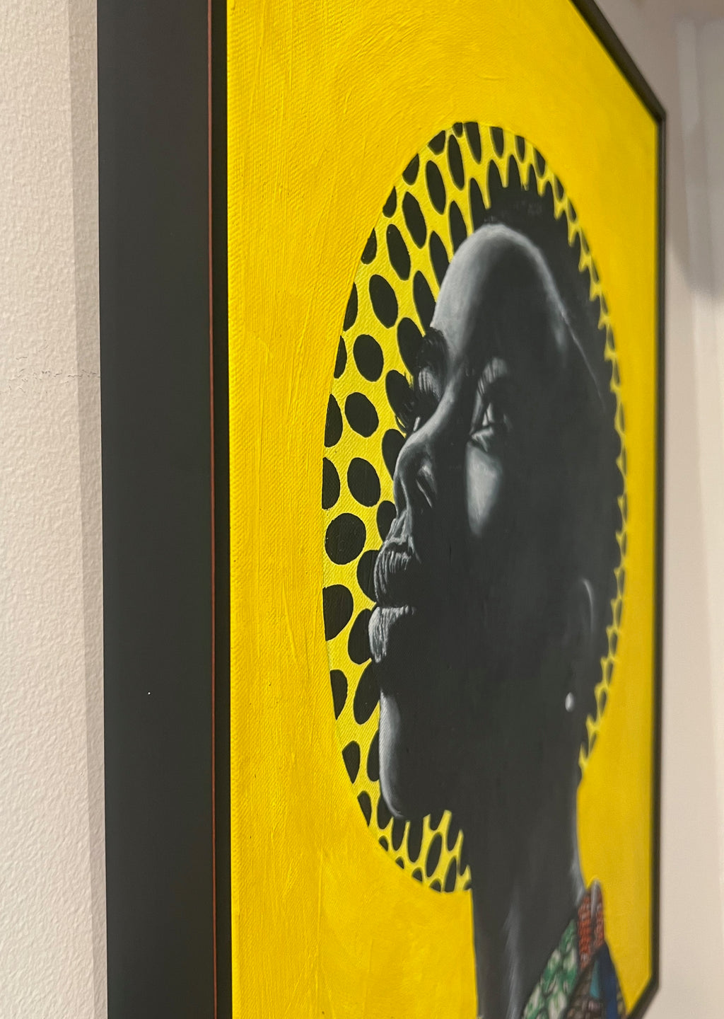 mixed media portrait of a black woman with yellow background, fabric and acrylic