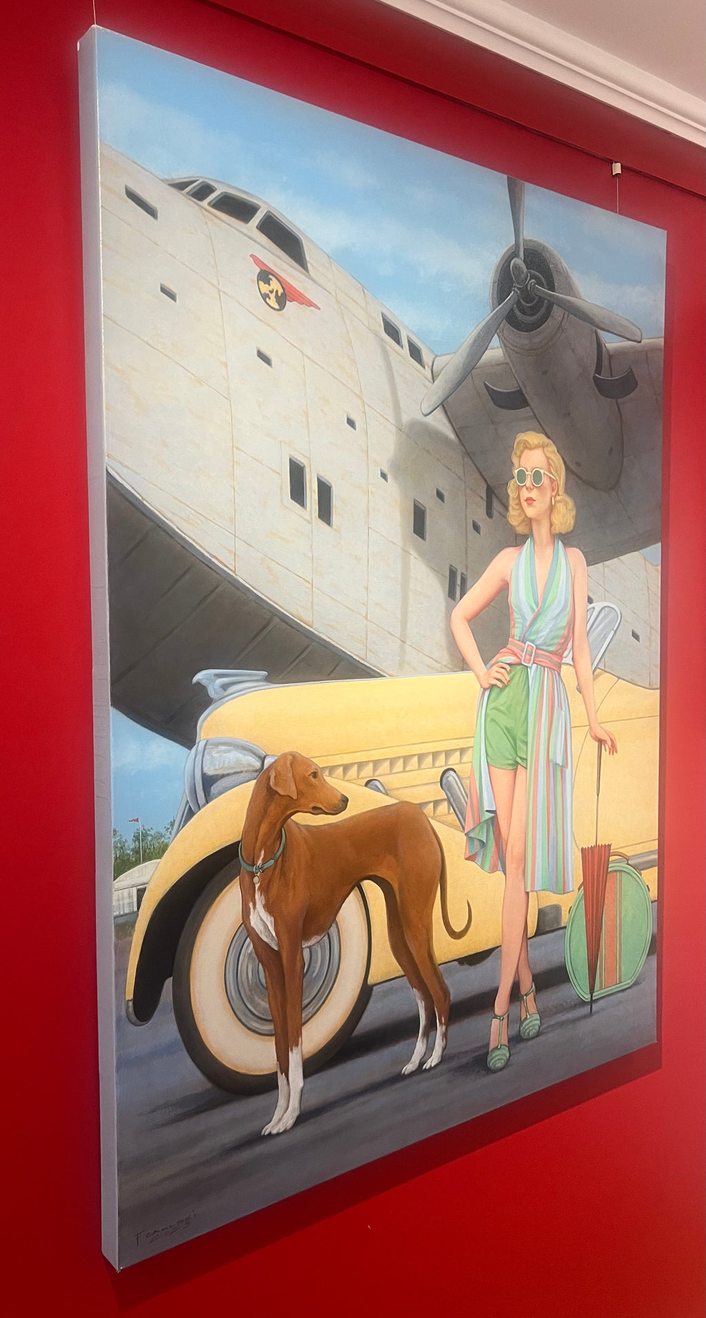 Oil painting of a blonde woman in sunglasses standing in front of a vintage yellow convertible and a Jet with brown dog