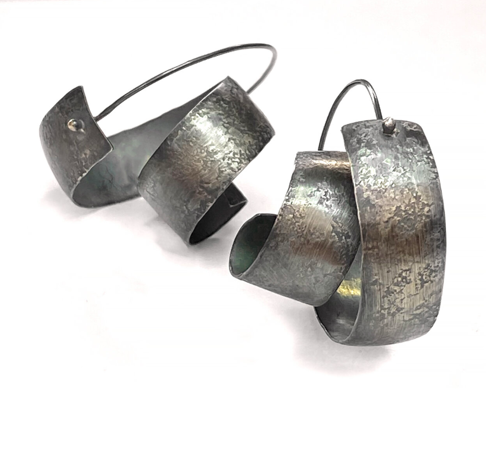 Oxidized sterling silver curly earrings with hammered details