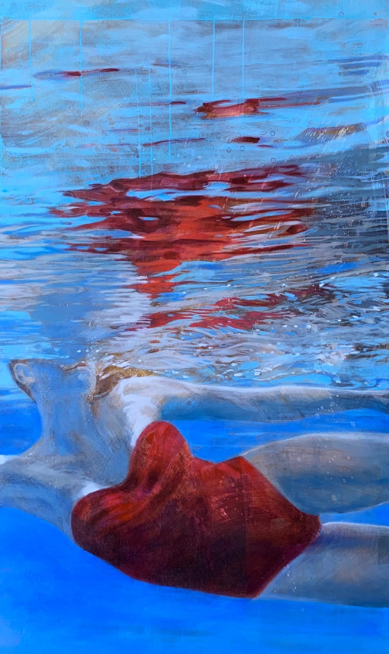 Underwater oil painting by Carol Bennett of swimmer with head above water, swimming on her side with red swimsuit and reflective water details on surface