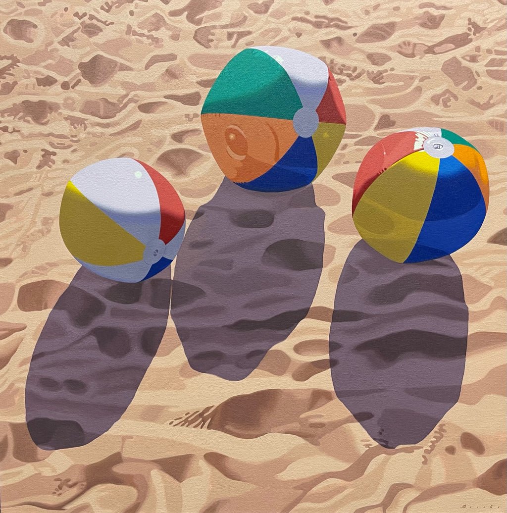Photorealist oil painting of three beach balls in the sand
