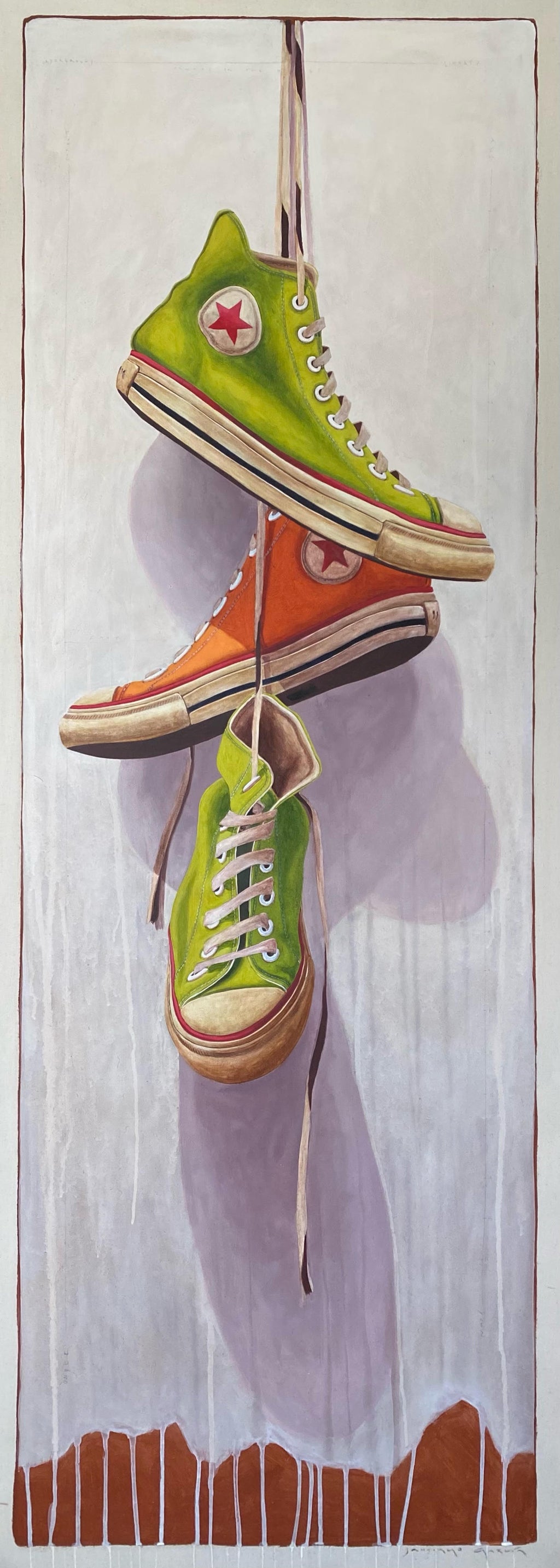 Large scale, vertical oil painting of green and orange high top converse sneakers hanging by laces