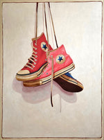 photorealistic oil painting of red, pink, and blue high top converse sneakers hanging by laces