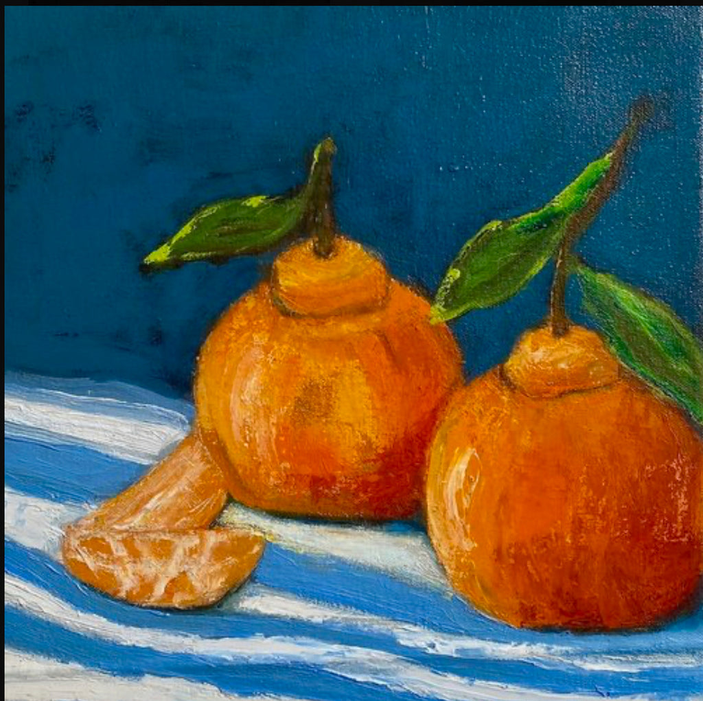 Oil on canvas painting of two Sumo oranges on a blue and white tablecloth, including two unpeeled slices.