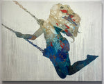 "Swing Thing" painting of a female silhouette swinging, her hair flowing in the wind behind her. The inner silhouette is embellished with vivid colors of blues, reds, and light yellows and surrounded by a beige border.