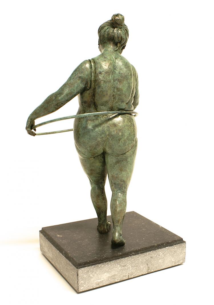 bronze sculpture by Veronique Clamot of a plus-sized model using a hoola hoop