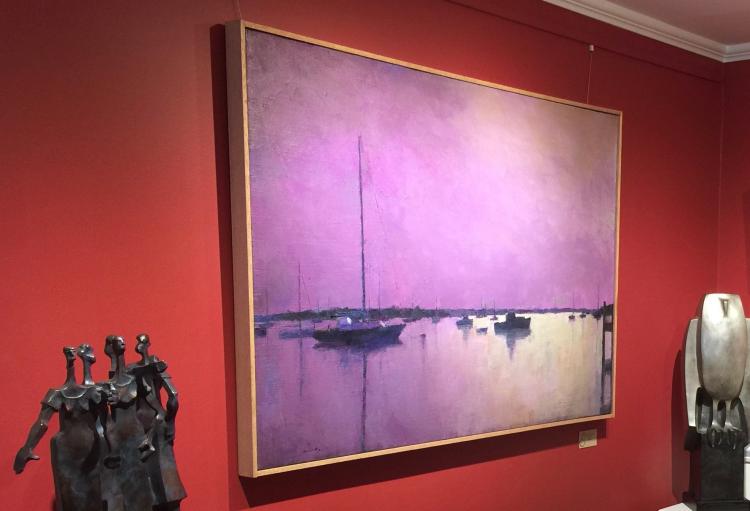 Oil painting by Larry Horowitz of sailboats silhouetted by a purple sunset sky 